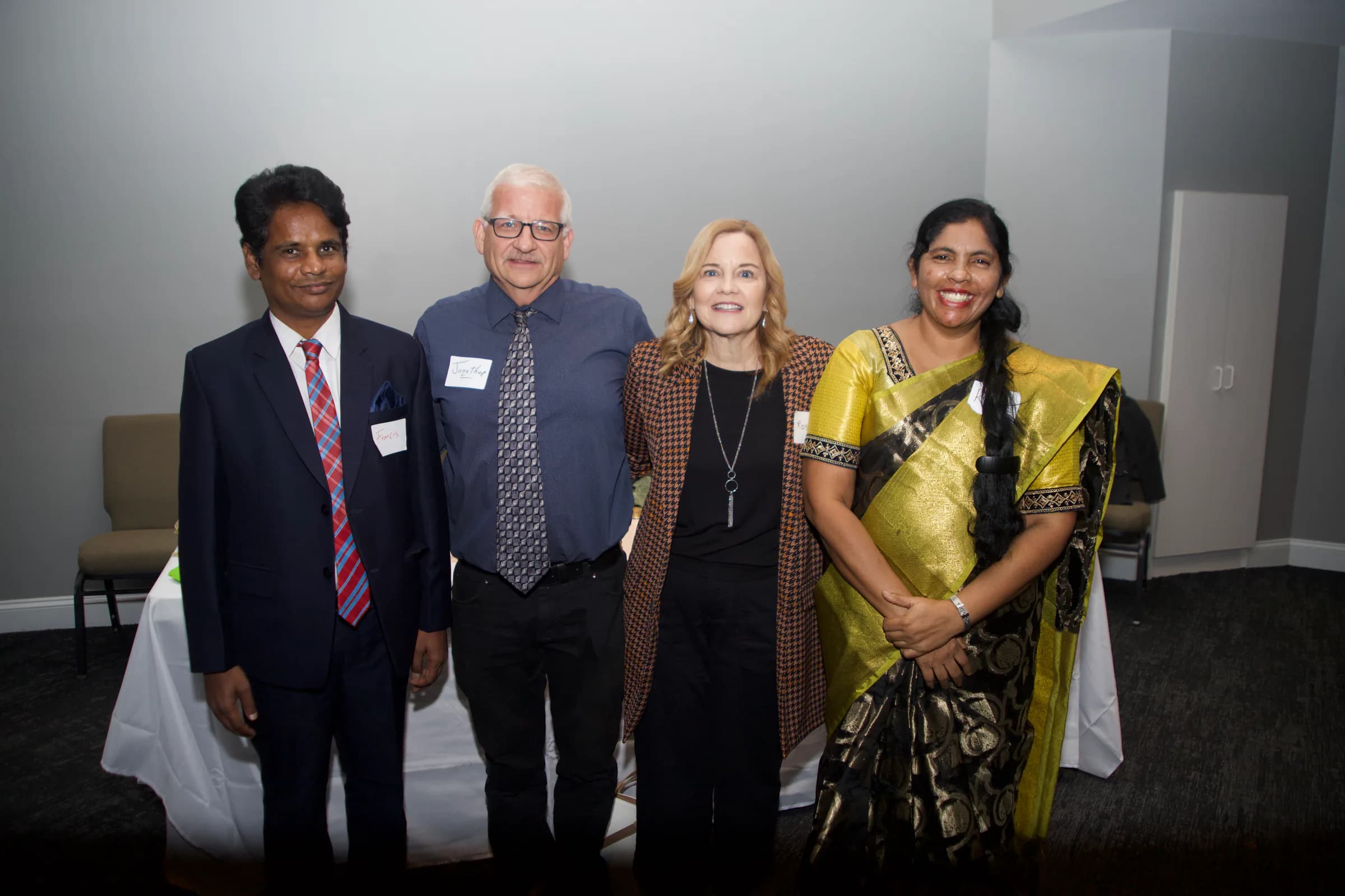 Ministry leaders with two friends of the ministry