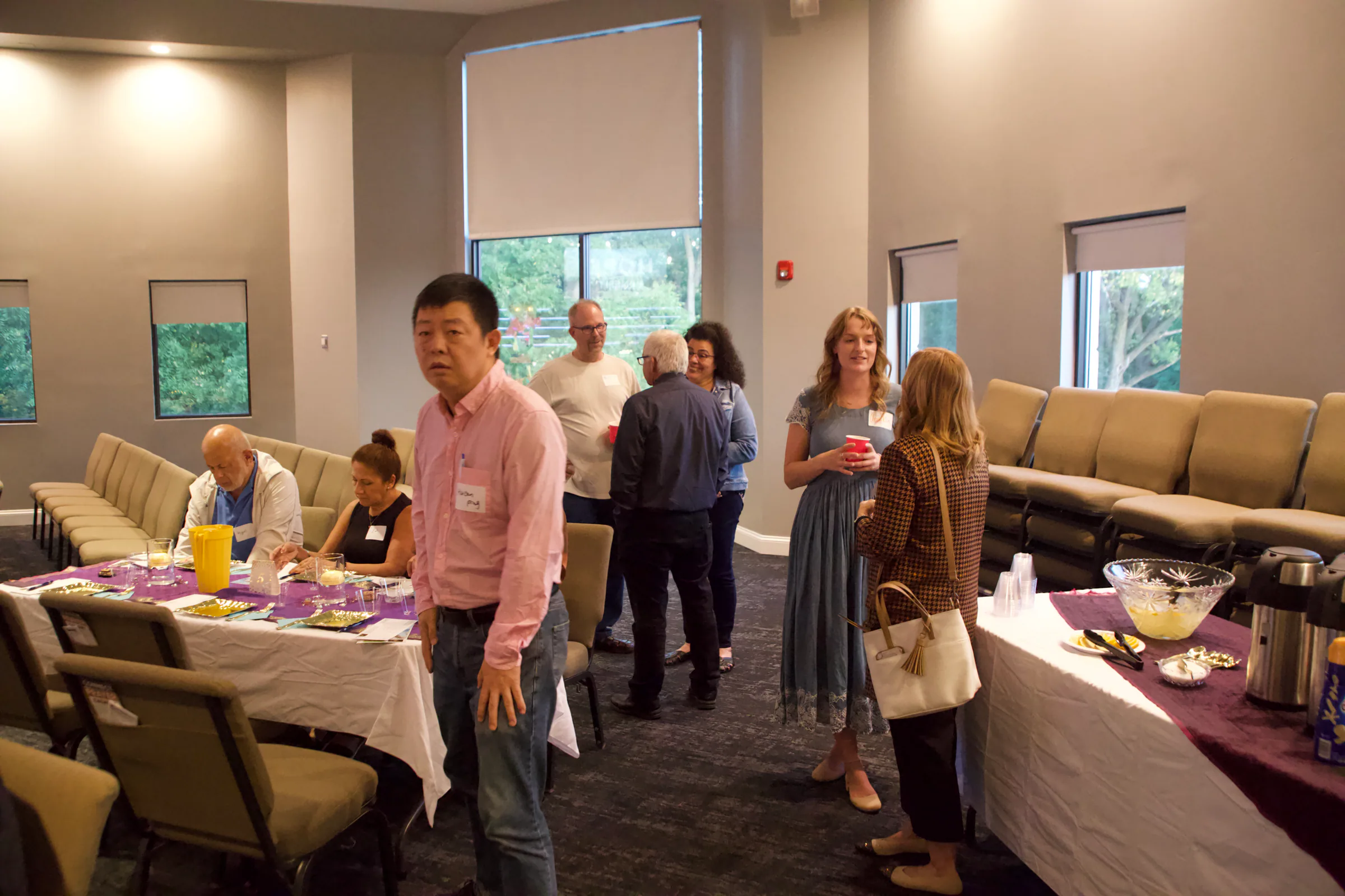 Guests arriving and mingling before dinner