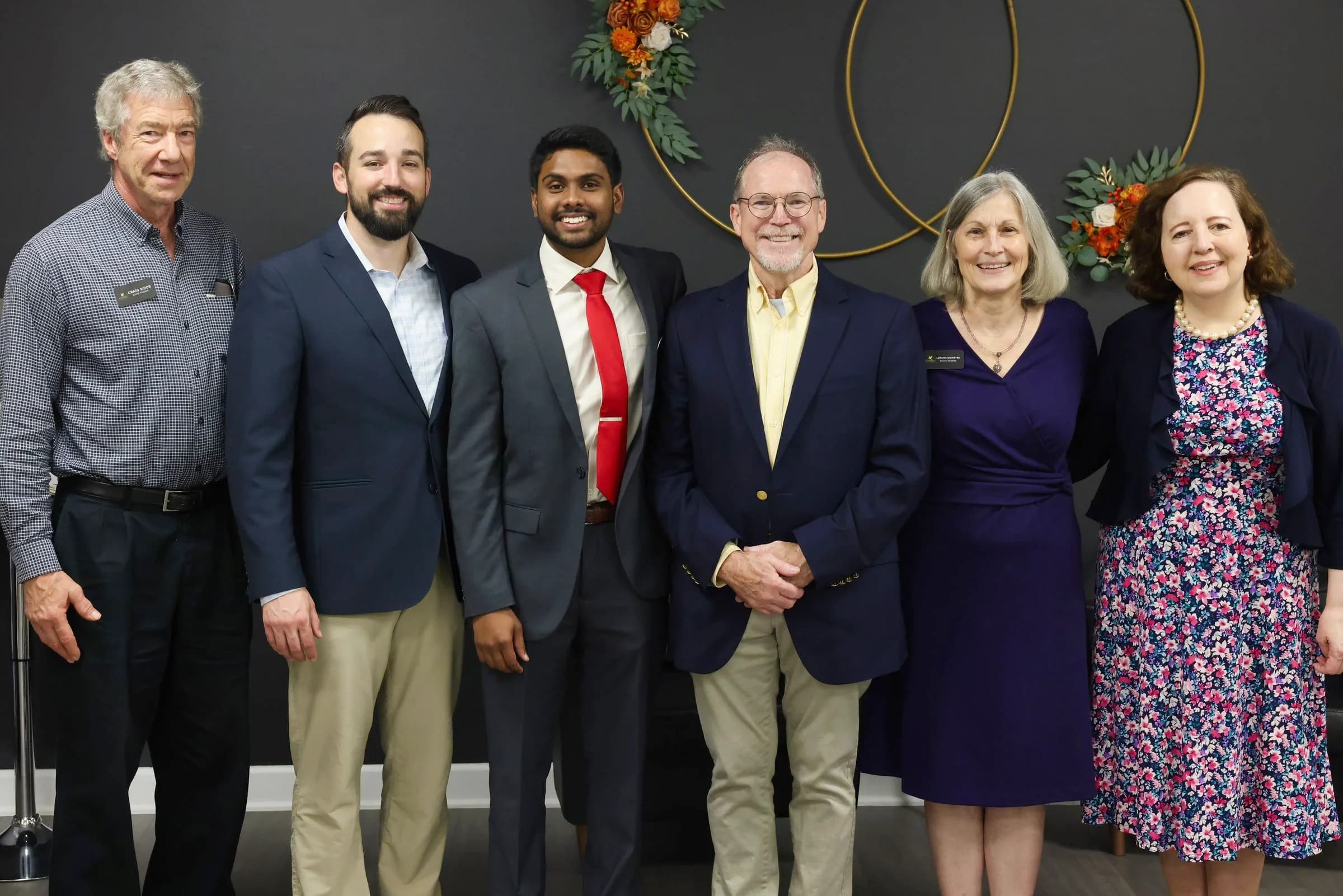 The ministry team and board members standing together